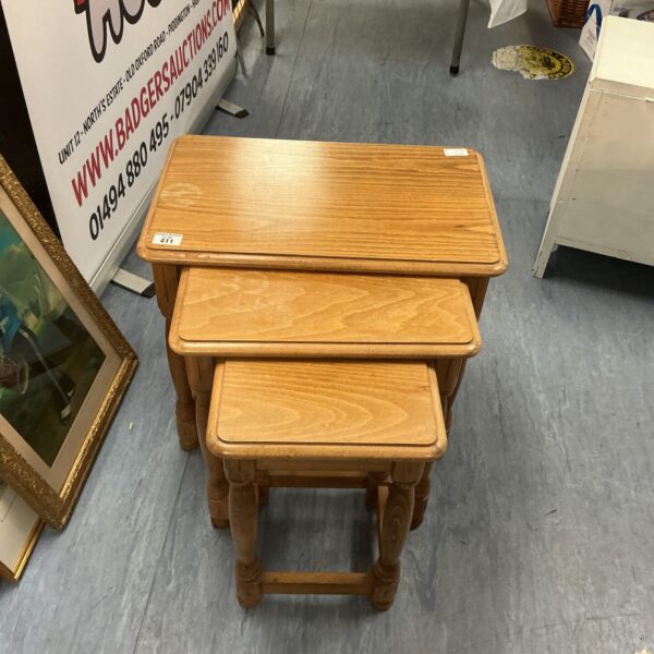 Vintage pine nest of tables in a rustic style.