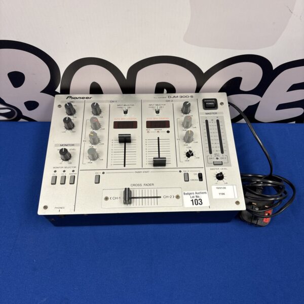 Pioneer DJM-300-S DJ mixer with controls and audio inputs.