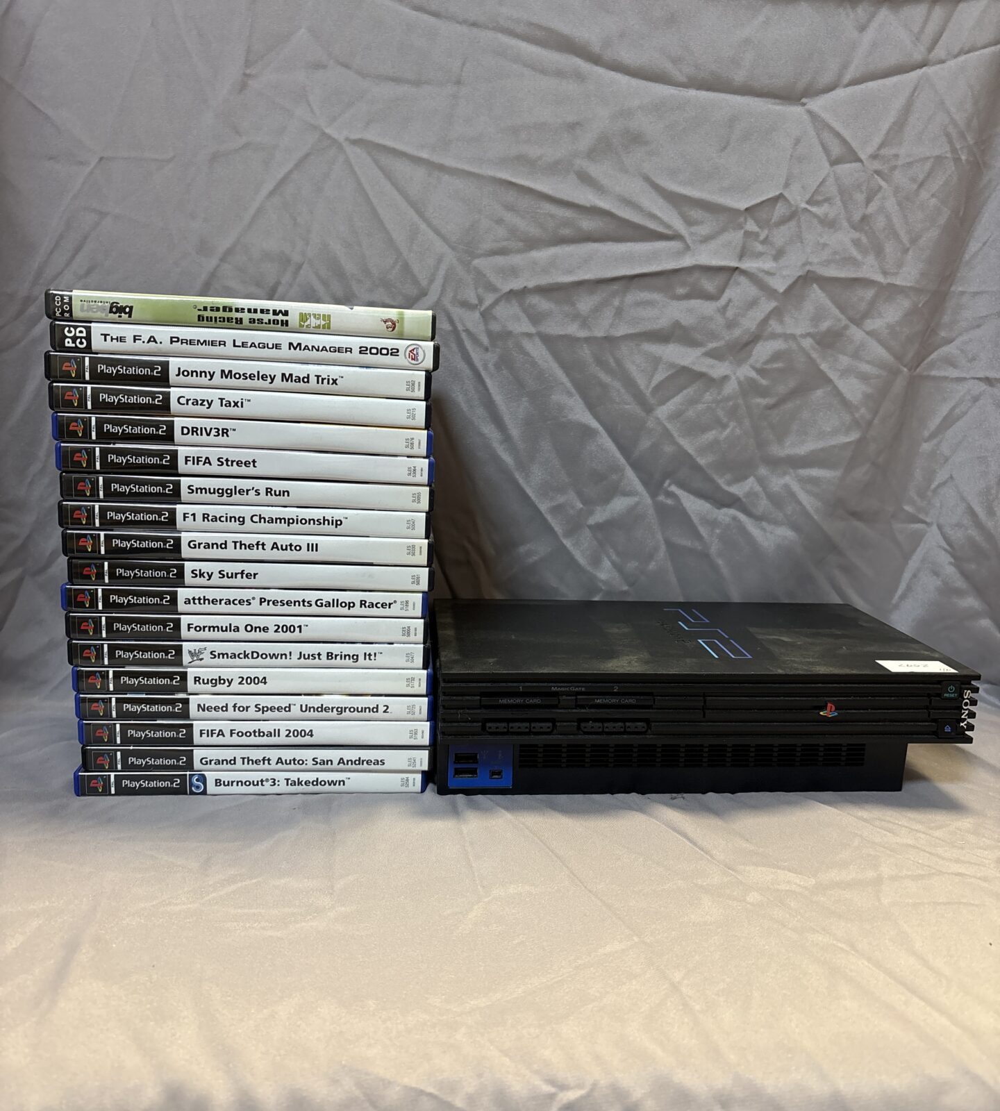 Ps2 Large Sony PlayStation two console with large collection of games – Badgers ...