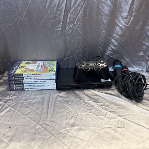 PlayStation 2 Slim bundle with SingStar accessories for retro gaming.