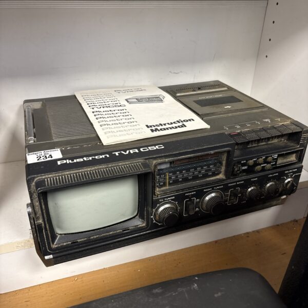 Vintage Plustron TVR C5C portable TV radio cassette player.