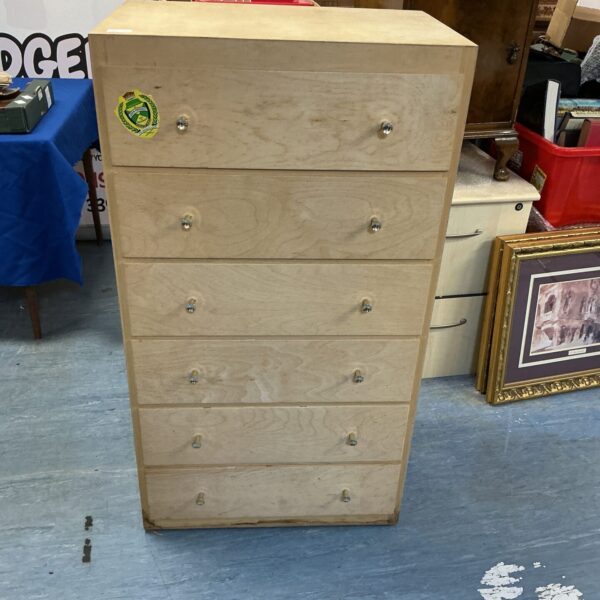 Vintage plywood six-drawer cabinet for storage and organisation.