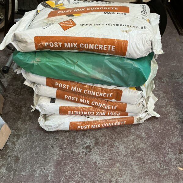 Six bags of unopened post mix concrete for garden projects.