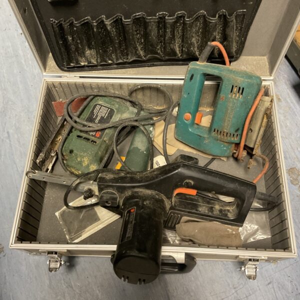 Vintage power tools lot including Black & Decker sander in a hard case.
