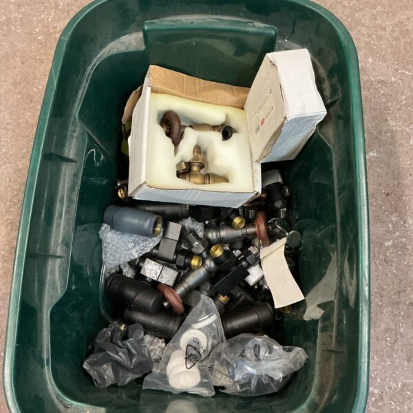 Large lot of central heating radiator valves and accessories.
