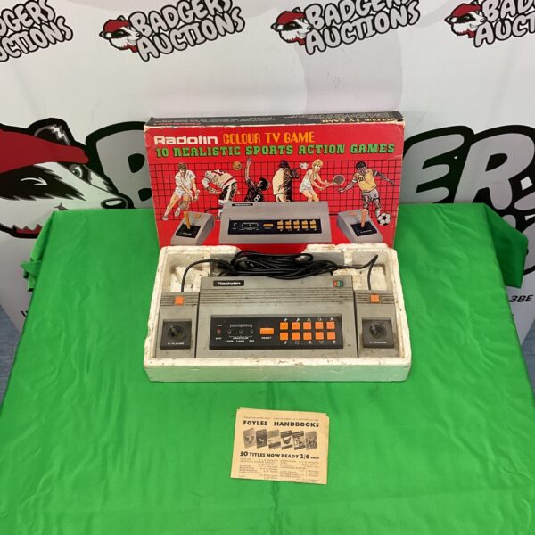 Vintage Radofin Colour TV Game handheld console with sports games.