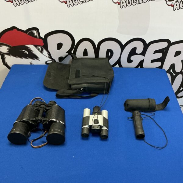 Vintage Riental 12x50 binoculars with accessories on display.