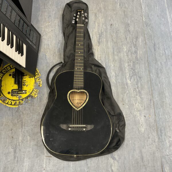 Dark finished Rino88 L-946-8 acoustic guitar with soft case.