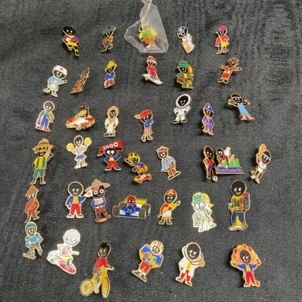 Vintage lot of 39 Robinsons golly enamel badges.