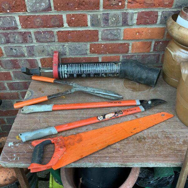 Vintage Rothenberger Super Pump and garden tool selection.