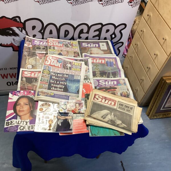 Royal Coronation newspaper collection featuring front pages and articles.