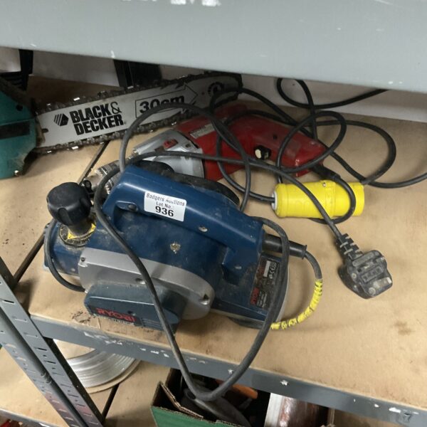 Close-up of a used Ryobi belt sander for woodworking.