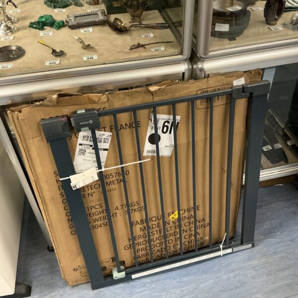 Used Safety 1st pressure fit stair gate for child safety.