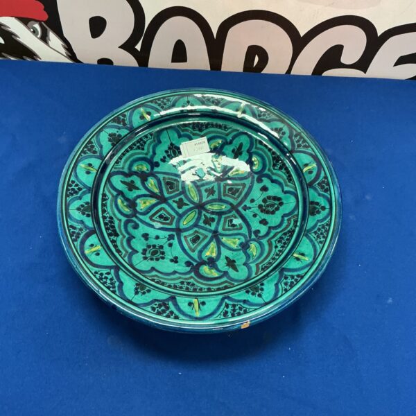 Antique Safi turquoise glazed charger with geometric design.