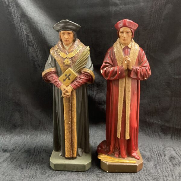 Antique French plaster statues of Saint Thomas More and Saint John Fisher.