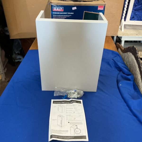 Compact Sealey wash basin cabinet for bathroom storage.
