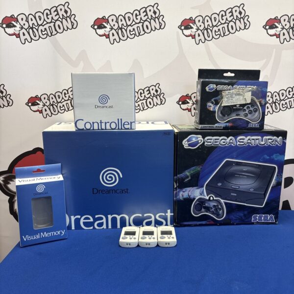 Sega Dreamcast and Saturn boxes lot with visual memory units.