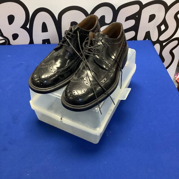 Black leather Sergio Serrano shoes size 39 with brogue detailing.