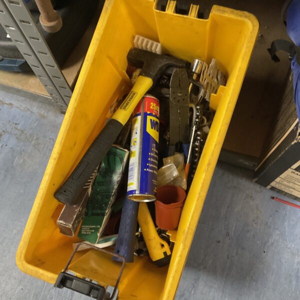 Mixed shed clearance lot with hand tools and gardening items.