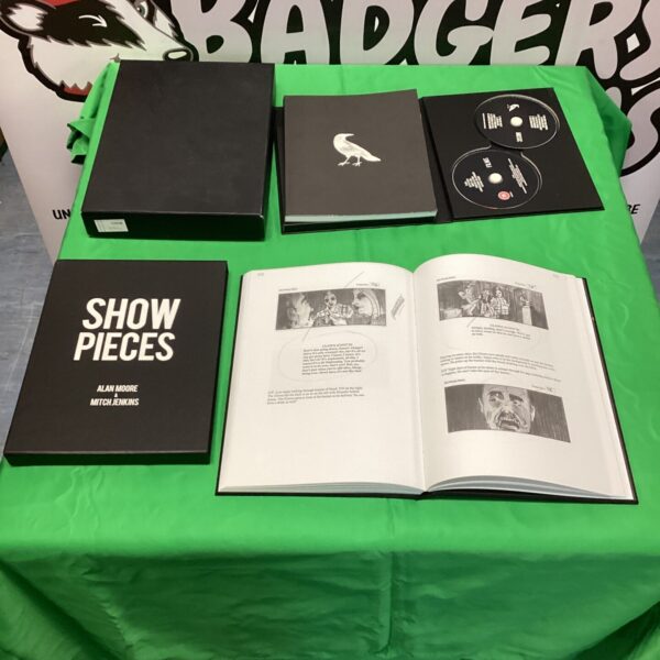 Show Pieces Alan Moore & Mitch Jenkins collection on green table.