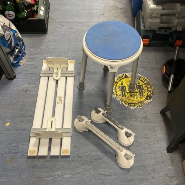 Lot of shower seats and grab handles for bathroom safety.