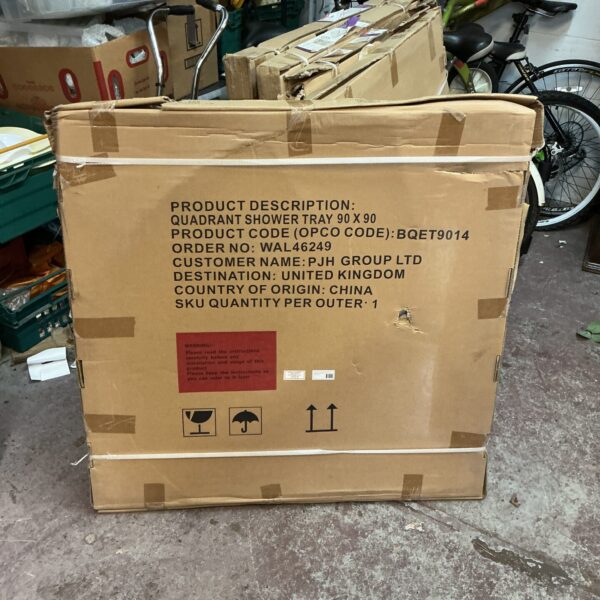 White Cooke and Lewis Helgea 90x90 quadrant shower tray in packaging.