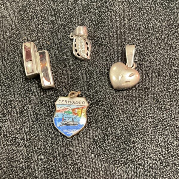 Vintage silver charms lot for collectors and jewellery making.