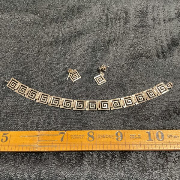 Vintage silver geometric bracelet and earring set, Art Deco style.