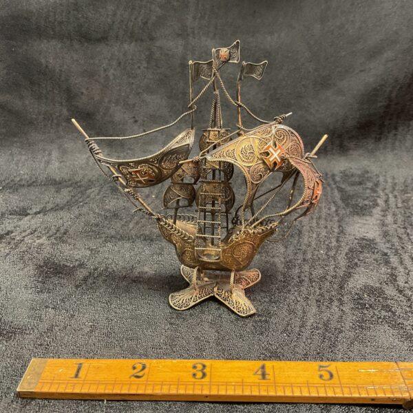 Intricate silver gilt filigree galleon model, antique nautical decor.
