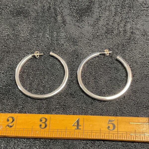 Pair of large silver hoop earrings, 925 sterling silver.