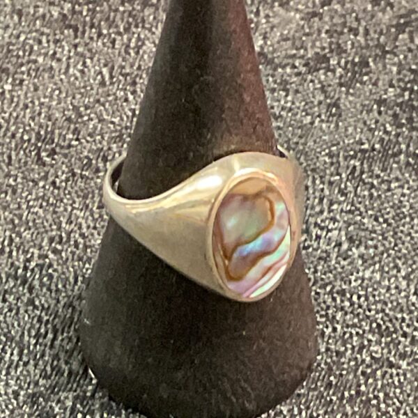 Silver ring with iridescent paua shell, size M.