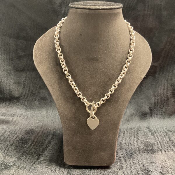 Vintage silver T bar necklace with a heavy chain.