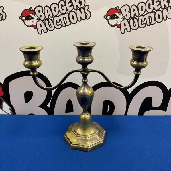 Vintage silver tri-head candelabra for table decoration.