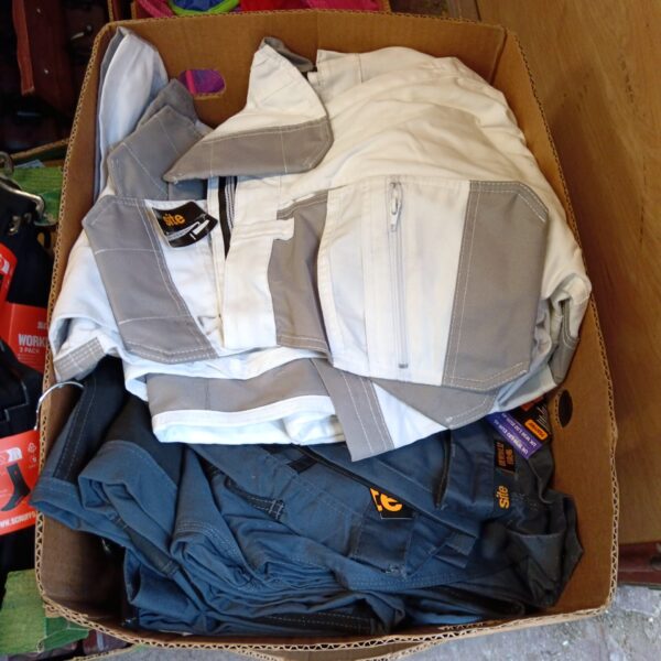 New Site work trousers in a box, durable workwear for construction.