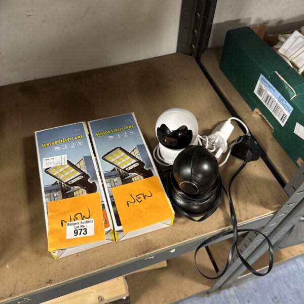 New solar powered street lights and security cameras in packaging.