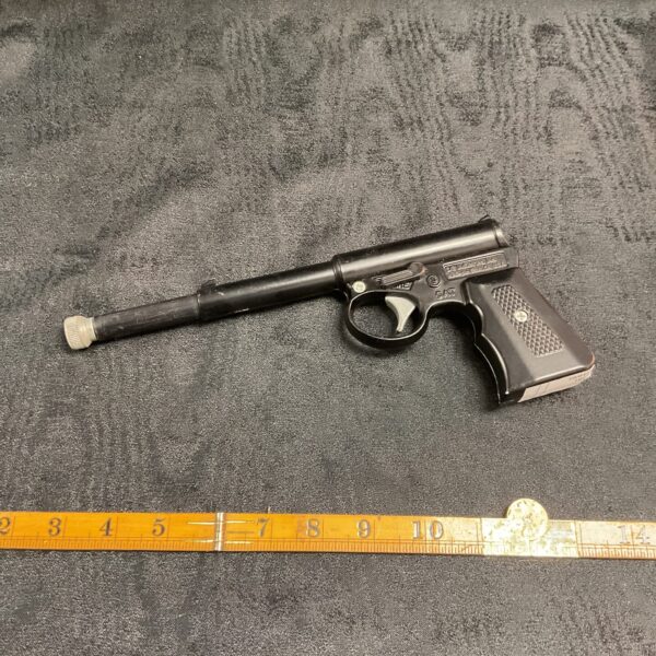 Vintage SR Industries Gat Gun toy from the 1990s, collectible plastic cap gun.