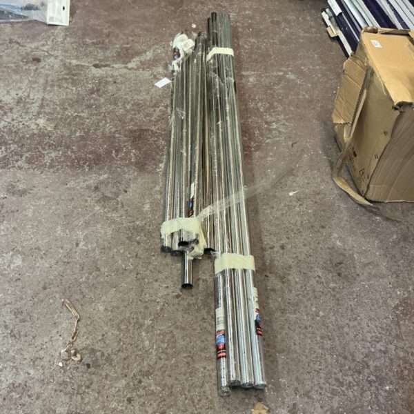 Lot of stainless steel clothes poles for laundry or storage.