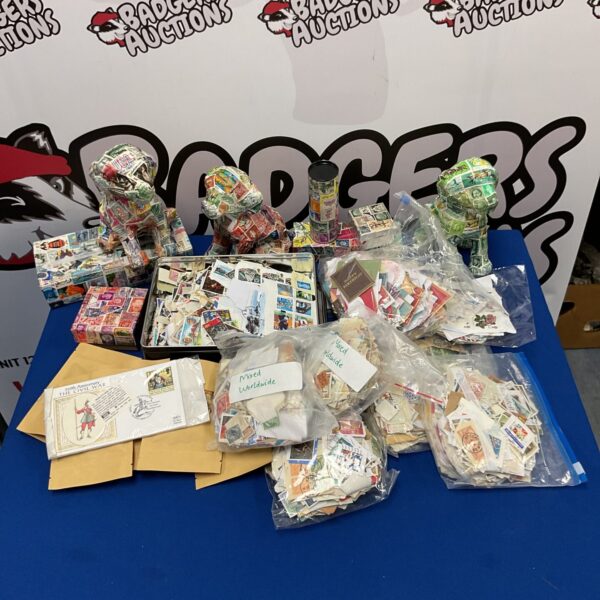 Diverse stamp collection with decoupage animal designs and vintage themes.