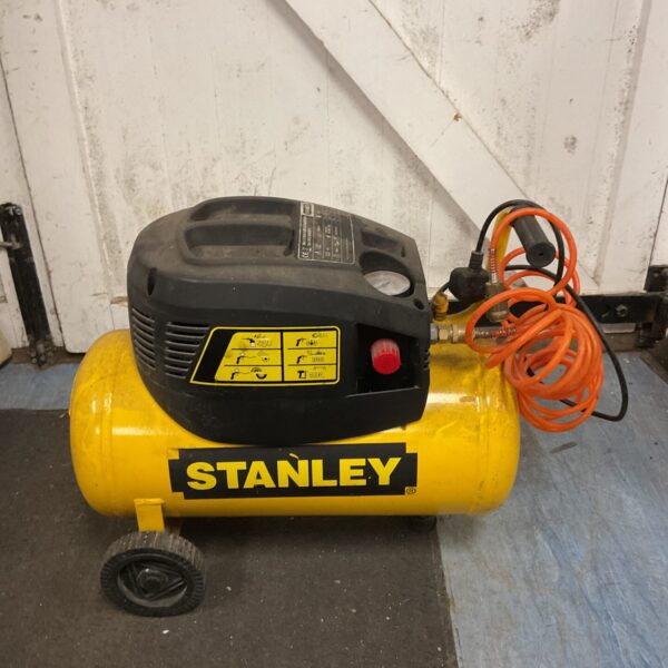 Portable Stanley D200/8/24 air compressor for workshop use.
