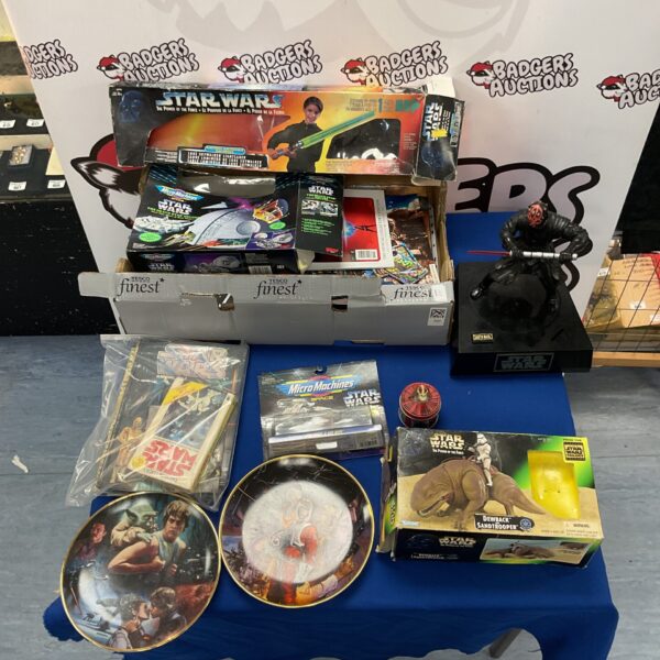 Vintage Star Wars packaging including Dewback and Sandtrooper boxes.