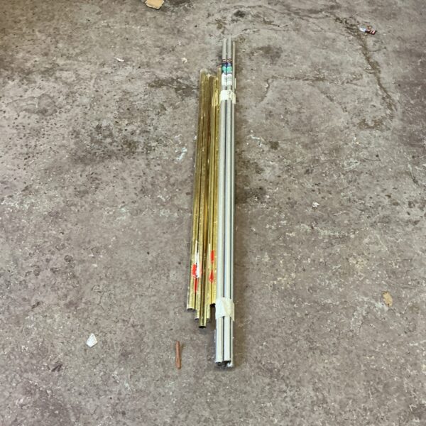 Lot of vintage steel tubing in brass and chrome finishes.