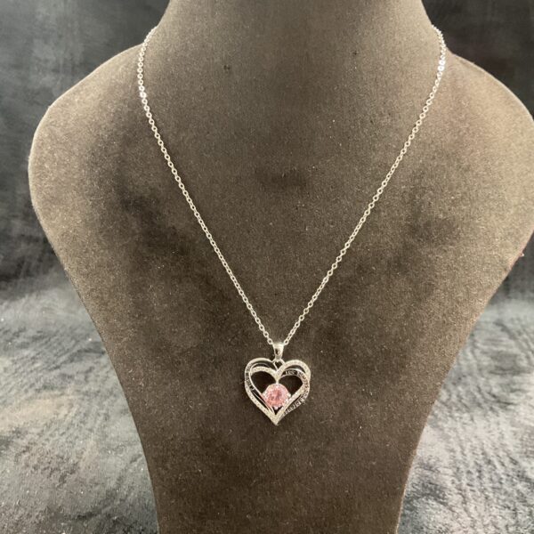 Elegant sterling silver necklace with a cubic zirconia heart pendant.