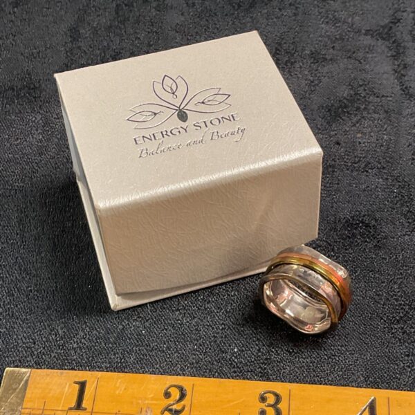 Close-up of sterling silver energy stone breeze ring, size U.