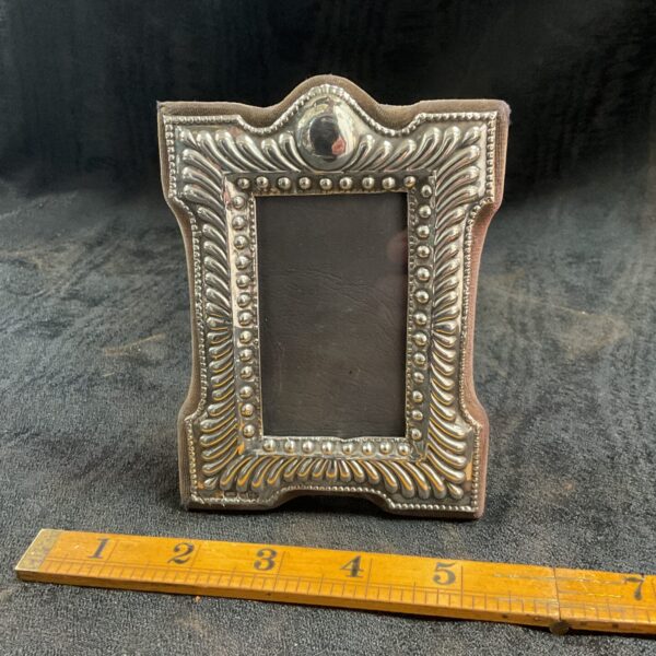 Ornate hallmarked sterling silver photo frame, antique silver collectible.