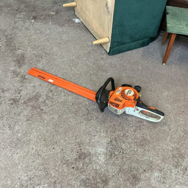 Used Stihl HS45 petrol hedge trimmer for garden maintenance.