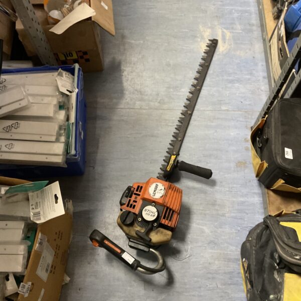 Used Stihl HS85 petrol hedge cutter for garden maintenance.