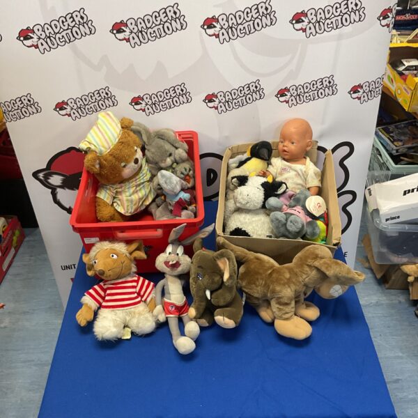 Stuffed toy lot with baby doll and plush animals.