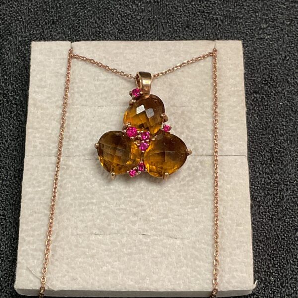 Stunning Swarovski amber pendant necklace with three crystals.