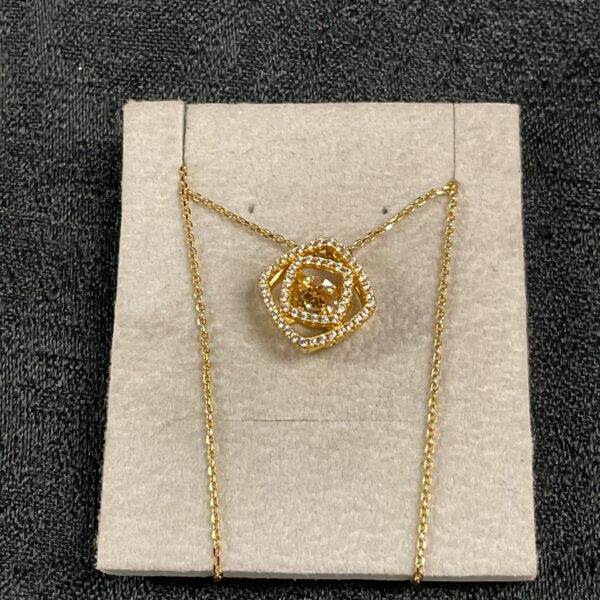 Elegant Swarovski shimmerstone pendant necklace with gilt setting.