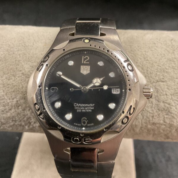Front view of a Tag Heuer chronograph watch with black dial.